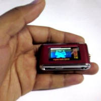 Mini Digital Quran shown in hand